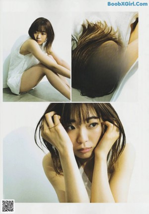 A woman laying on the floor with her legs crossed.
