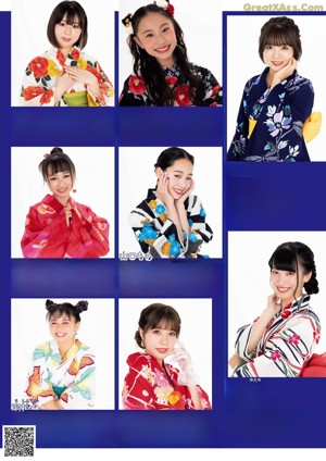 A group of women in kimonos posing for a picture.